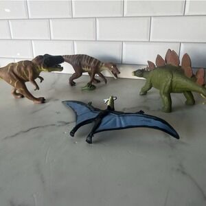 Lot of 4 Dinosaurs Plastic  Figures 2004 K&M  Stegosaurus T-Rex Pteranodon VTG